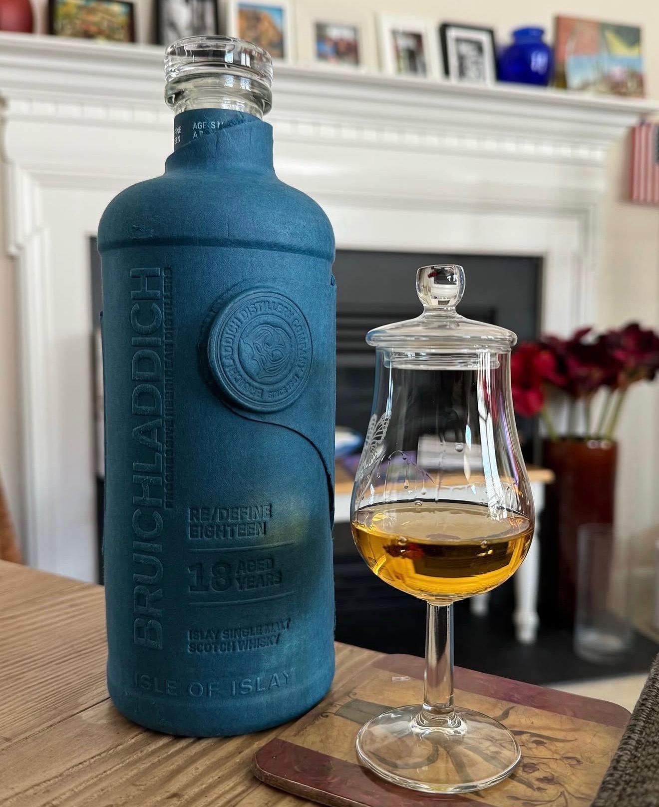 A rare scotch bottle and tasting glass